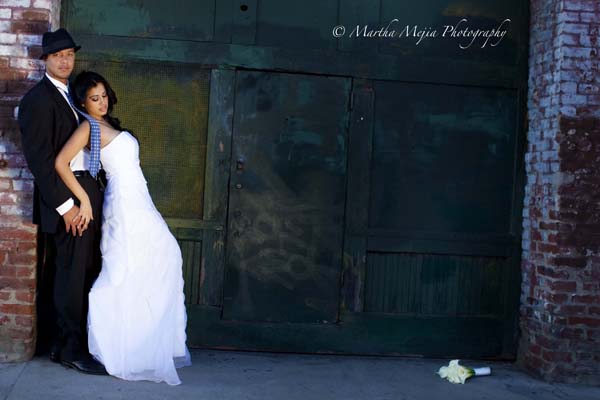 Female and Male model photo shoot of Martha Mejia, Carla Soto and Chris D Anna in Downtown LA, makeup by Angely Murillo
