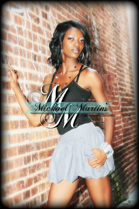 Female model photo shoot of Roshunda Holloway in Downtown Macon, Ga.