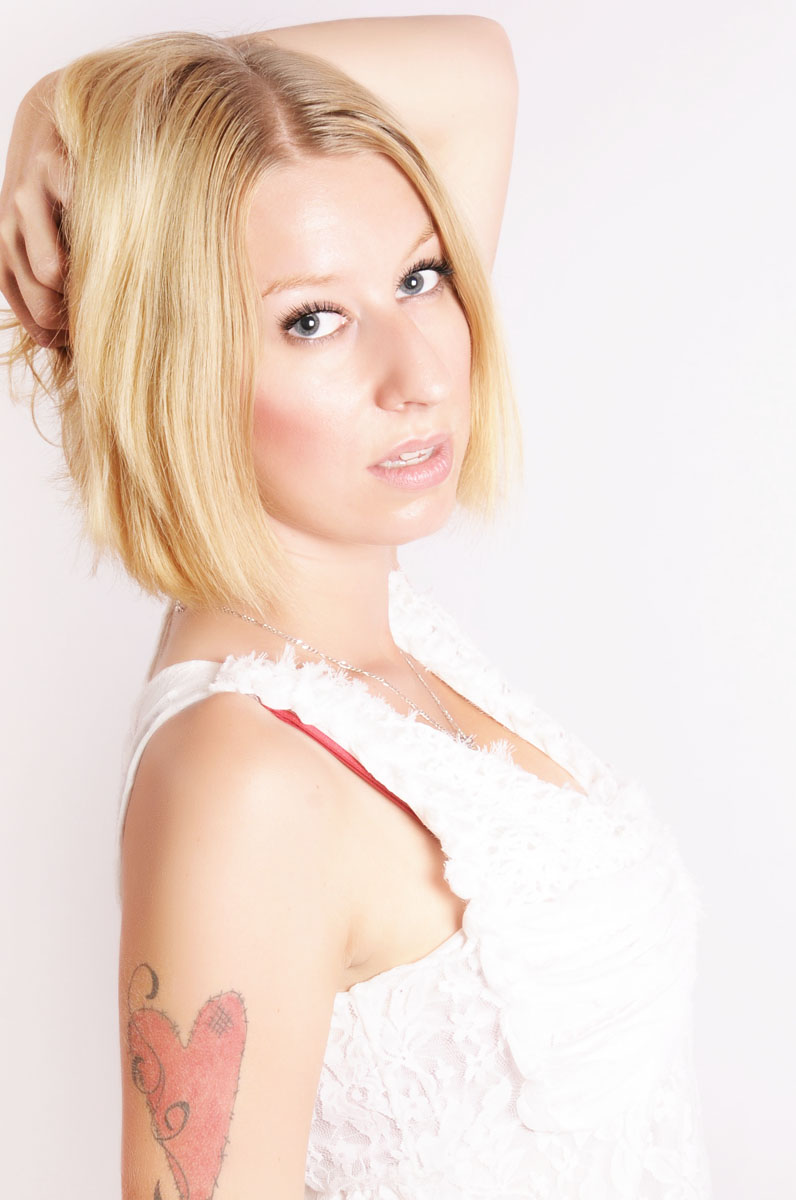 Female model photo shoot of Rachel Red Queen