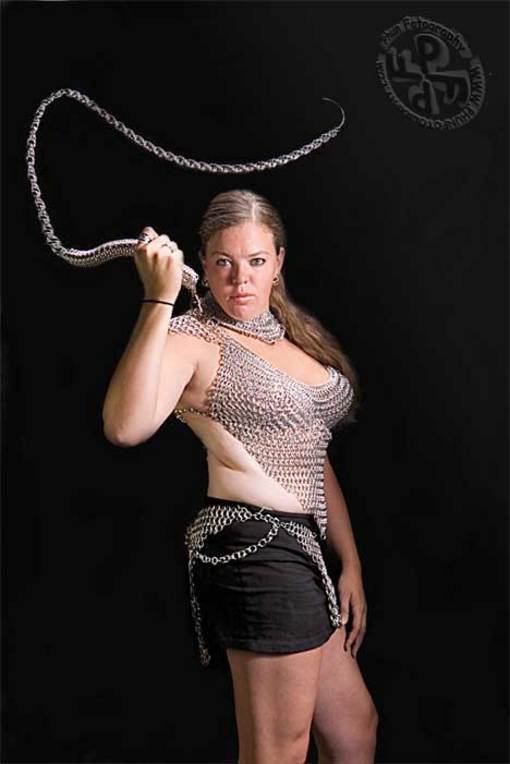 Female model photo shoot of ILLIANA by PF Dark in Ypsilanti, MI, clothing designed by Pendragon Chainmail