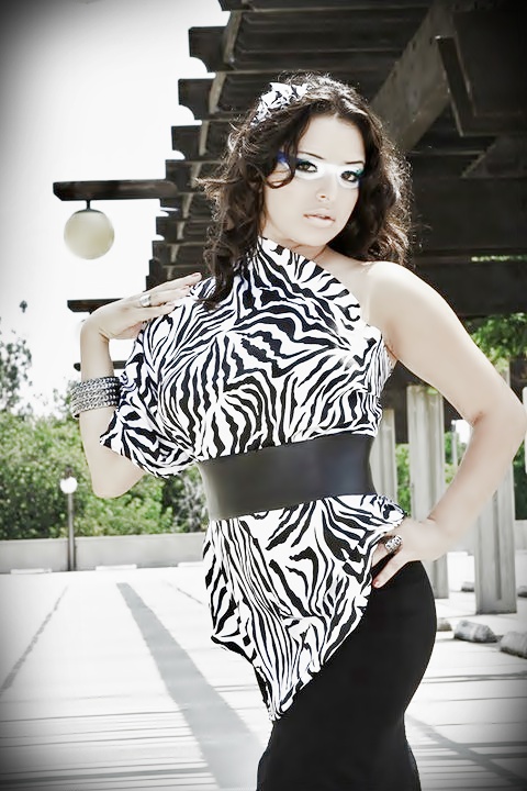 Female model photo shoot of J Farah by sdthjkyf, makeup by Faces by Amirah, clothing designed by Leondra Renee
