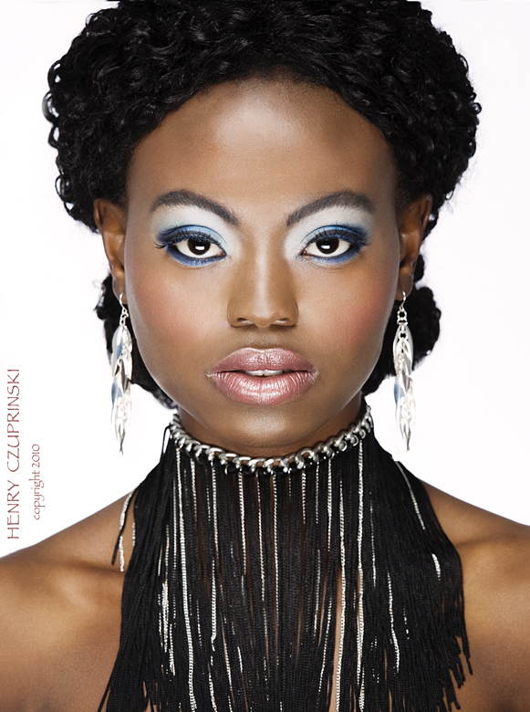 Female model photo shoot of Ahavel by Henri3 in Minneapolis, MN, makeup by Mani Mela