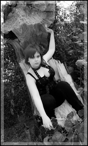 Female model photo shoot of Nancy Kirkyard by dmphotouk in New Calton Graveyard, Edinburgh