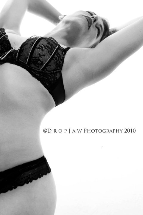 Female model photo shoot of Amber Charlemagne by DropJaw Photography