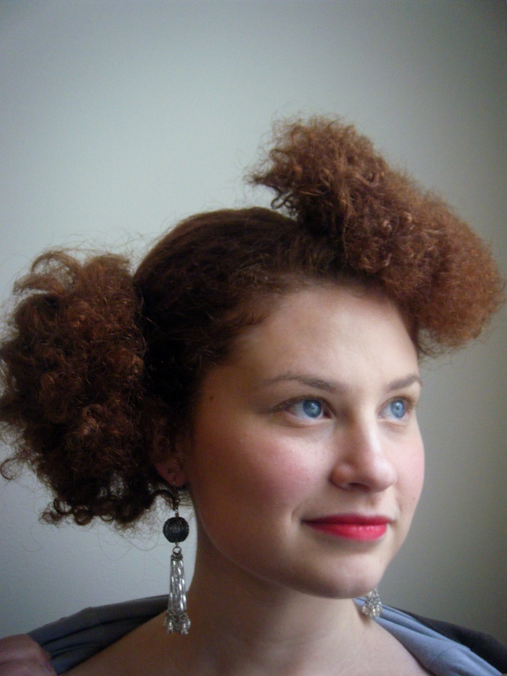 Female model photo shoot of Pin Curls and Pomade