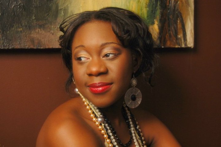 Female model photo shoot of Tosin1 in Chicago, makeup by Ewa Makeup Artist