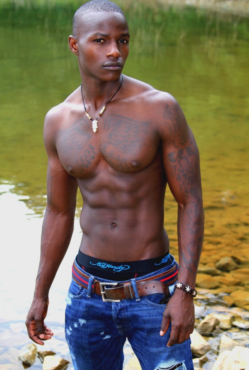 Male model photo shoot of Abuya in lake