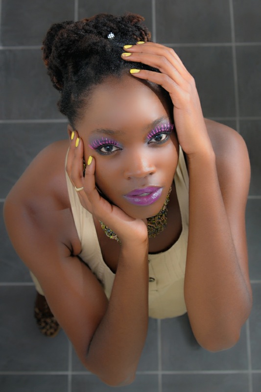 Female model photo shoot of Queen Ayize by Seabrook Photography in Orlando Fla, makeup by Beautiful-By-Design