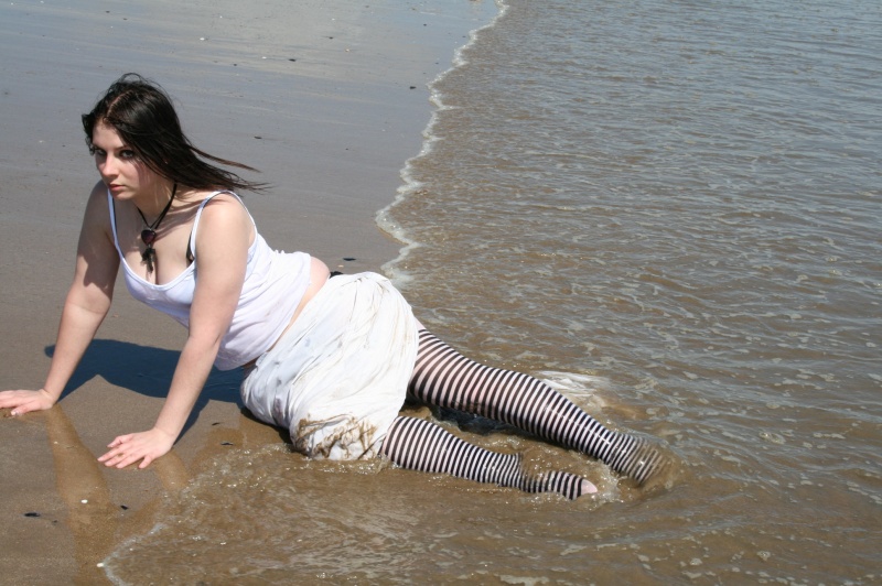 Female model photo shoot of CT Media and Lady Noctis in Swansea Bay Beach, Wales, UK