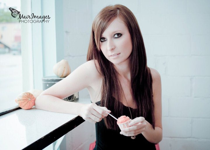 Female model photo shoot of Melissa Freyermuth by MairImages Photography in Austin Texas, cupcake shop on 1st