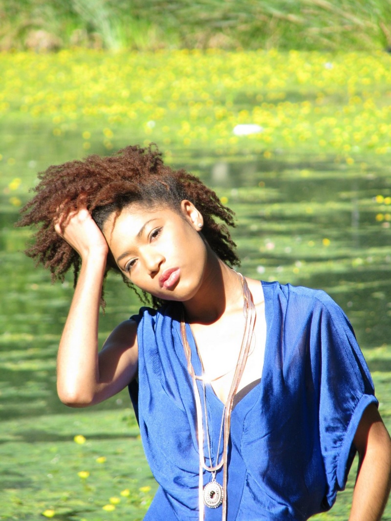 Female model photo shoot of Torkwasa marsh by Ilya77