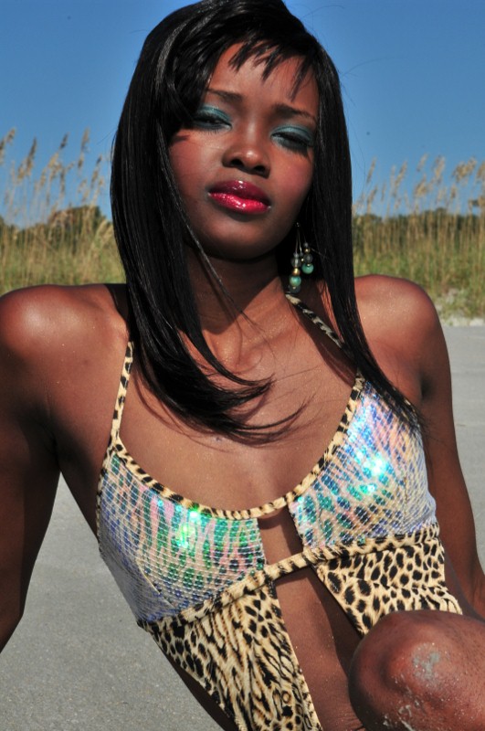 Female model photo shoot of Ms Mollie by Photos By Gary LLC, makeup by Reginatheartist