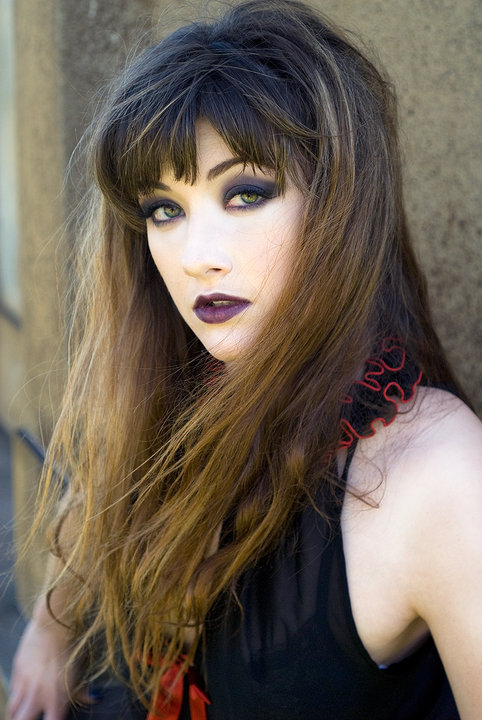 Female model photo shoot of SammySierra in Piedmont Cemetery, makeup by Sandra Martin MUA