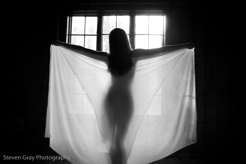 Female model photo shoot of Implied by Shades of Gray Fine Art