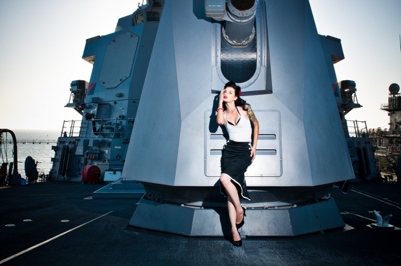 Female model photo shoot of Niki Dodge in On in service Navy Destroyer