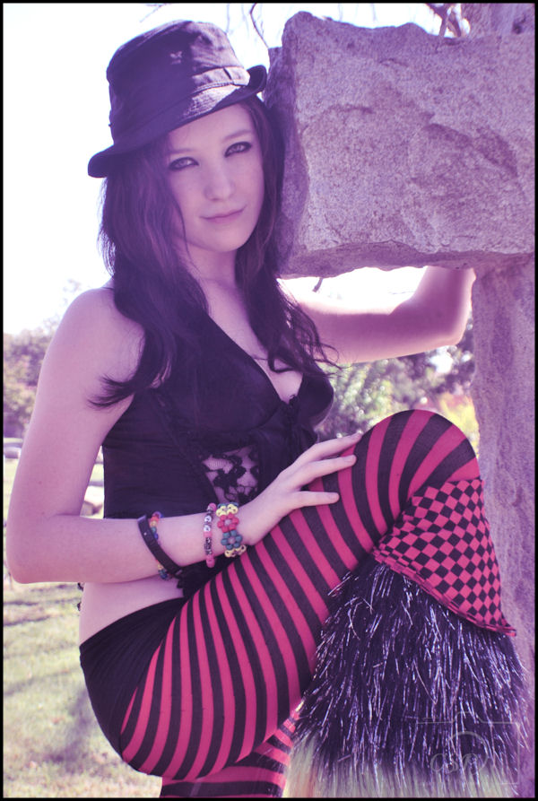 Female model photo shoot of Captive Soul Photo in Texas State Cemetary, Austin, Texas