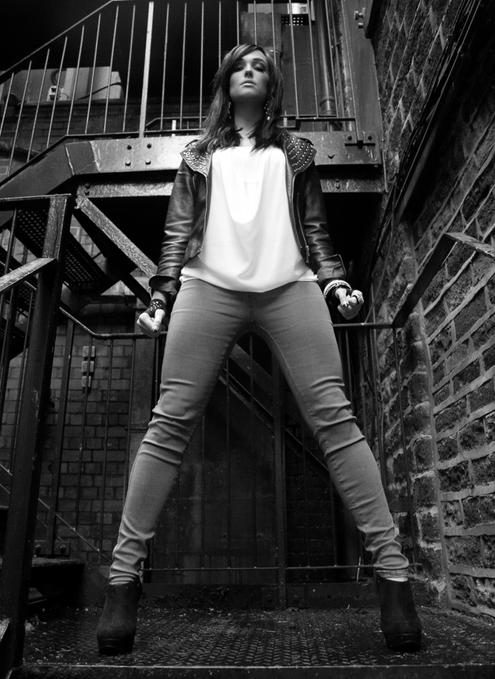 Female model photo shoot of Francesca Goody by Natascha Horan in Huddersfield Fire Escape