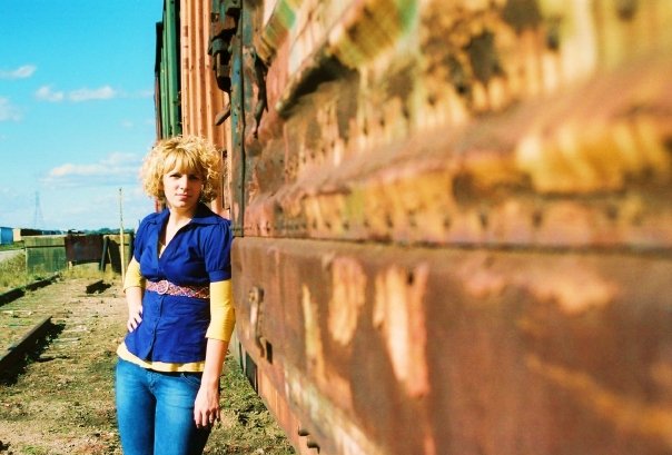 Female model photo shoot of sturm a in Abandon Train yard