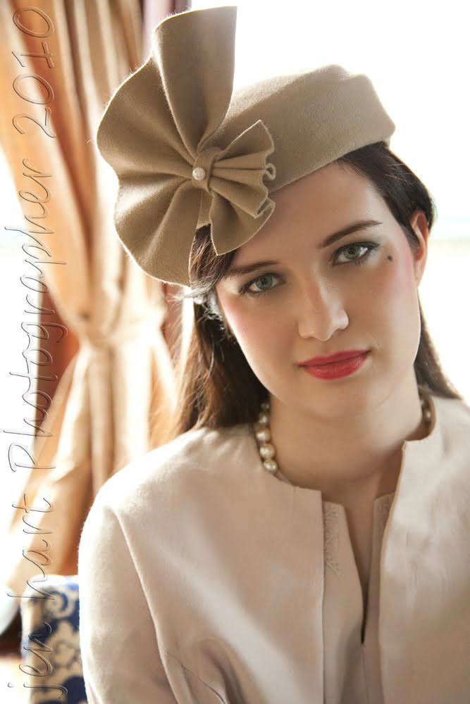 Female model photo shoot of EmilySue in NYMR - Grosmont Station, clothing designed by Suzanne Gill Millinery
