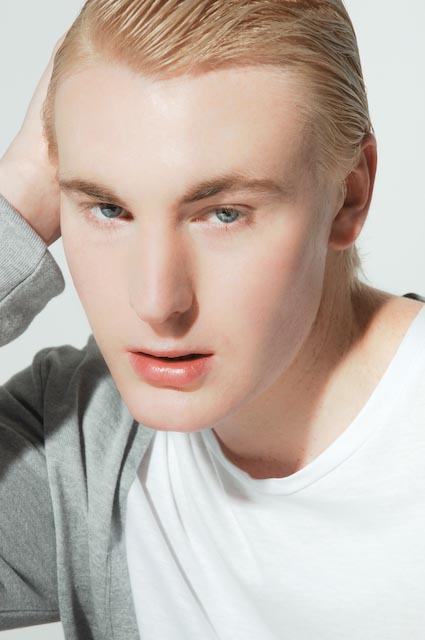 Male model photo shoot of Jordan Reynolds in studio