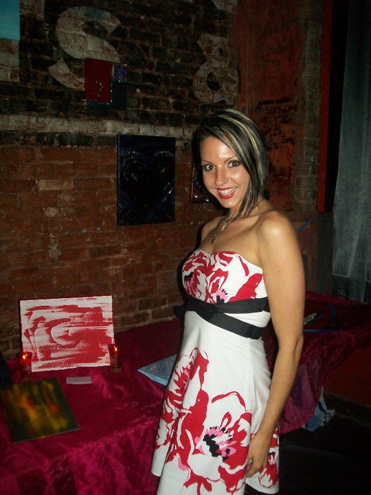 Female model photo shoot of Carrie McKinney in Red or Dead Fashion Show Atlanta 2010