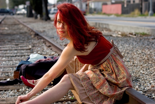 Female model photo shoot of Amanda Klein in usc railroad tracks