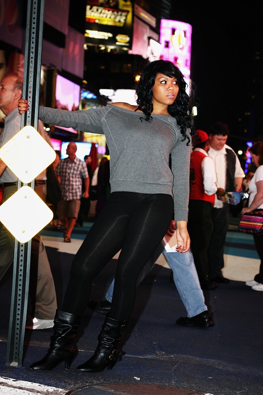 Female model photo shoot of Dimequia LeShell in Times Square, NY