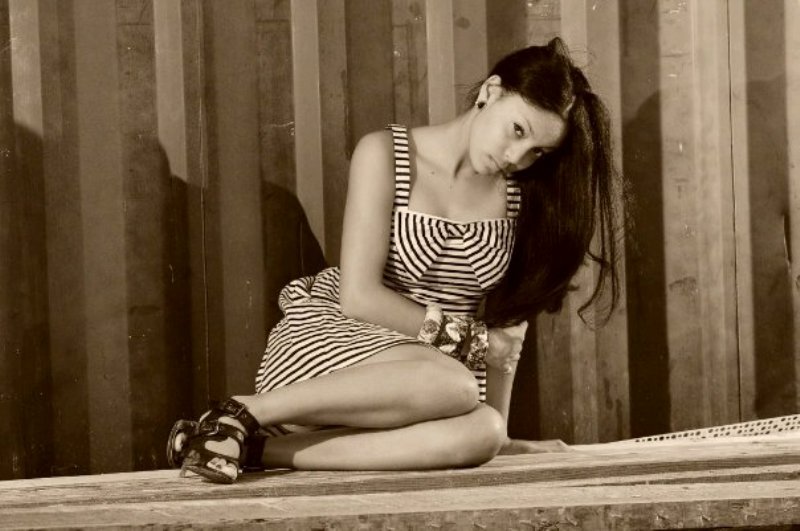 Female model photo shoot of Tatyana Ortiz in Junk yard, bermuda