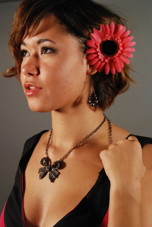 Female model photo shoot of Ashley Mazyck by Troofire Photo, clothing designed by John JNL Leon