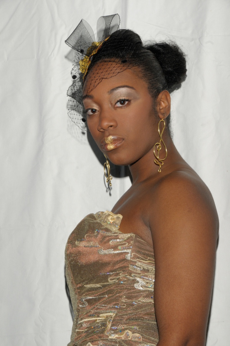 Female model photo shoot of Cherry Artistry in Born Genius Entertainment Fashion show, clothing designed by Nubian Elite