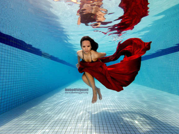 Male and Female model photo shoot of Bobo Underwater Pixel and Wyda Read in Kuala Lumpur