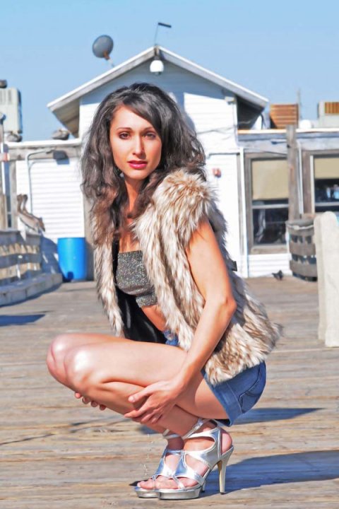 Female model photo shoot of Christys Cuts and Dina Pezzimenti by Seabrook Photography in Cocoa Beach Pier