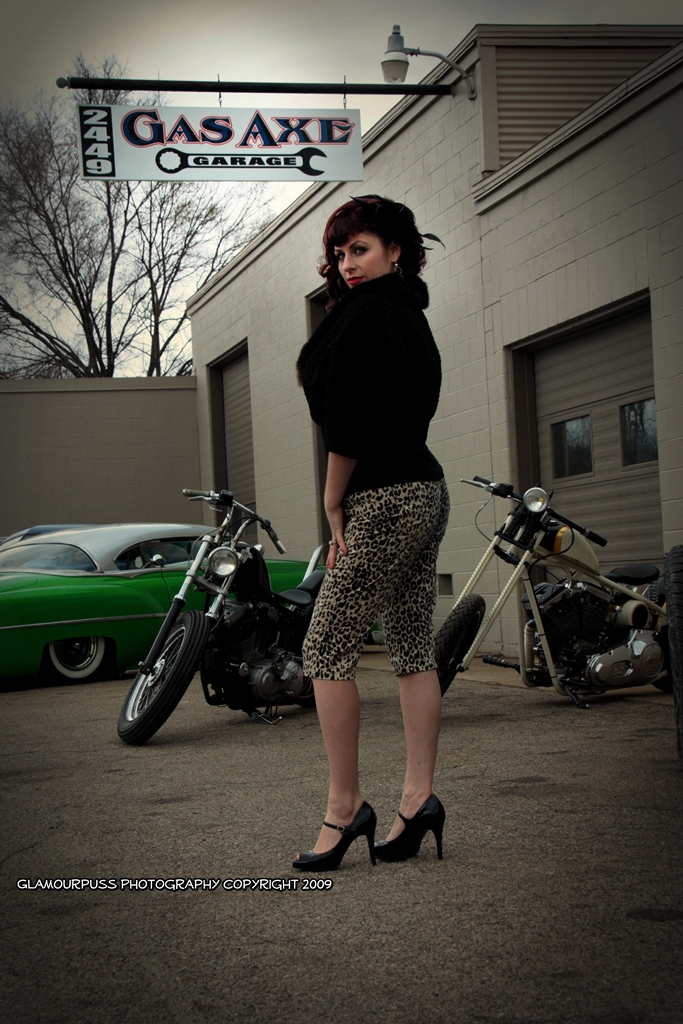 Female model photo shoot of Glamourpuss Photography in Gas Axe Garage, Grand Rapids, MI