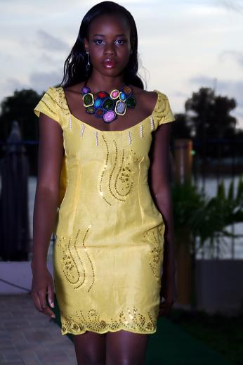 Female model photo shoot of Olatosweett Dresses in Nigeria