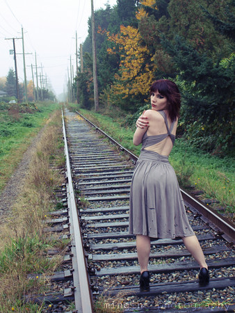 Female model photo shoot of Angela Descalzi by Ming Lin in Train Tracks