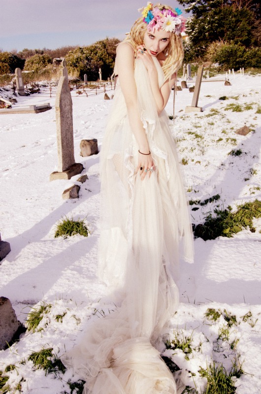Female model photo shoot of Luxiebow in portmarnock graveyard
