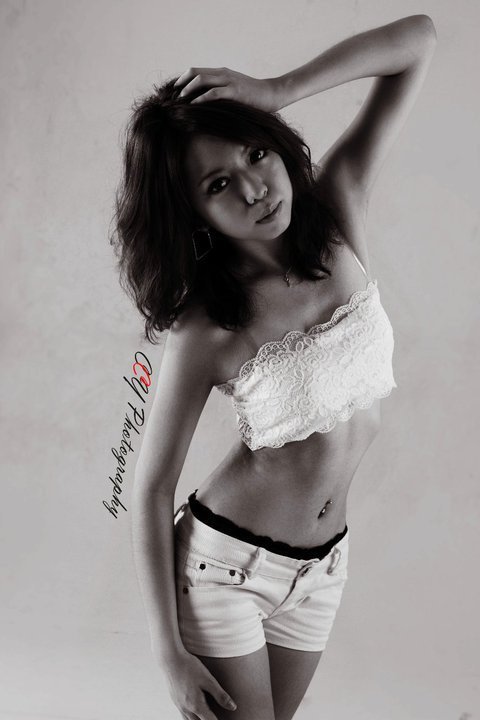 Female model photo shoot of Mei Wen in studio