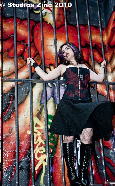 Female model photo shoot of Nina Masque in Hosier Lane, Melbourne, makeup by Jess Howlett