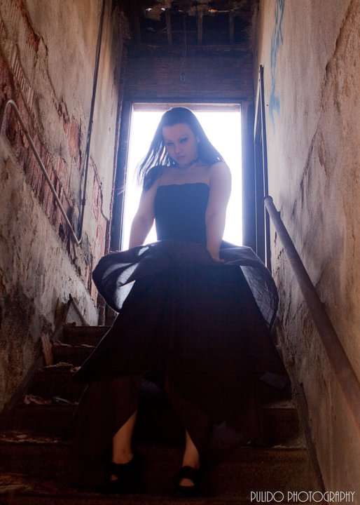 Female model photo shoot of Rose Noir by Tony Pulido in Secret Location, clothing designed by DevoidandDeveil