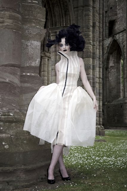 Female model photo shoot of claire andrew design in Tintern Abbey
