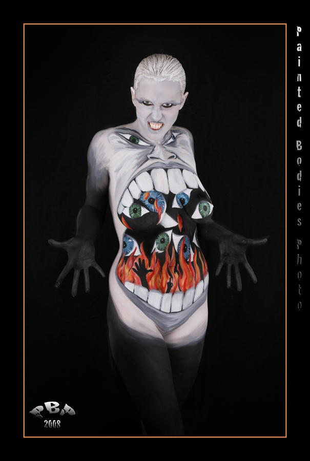 Female model photo shoot of ErinMcD, body painted by Painted Bodies