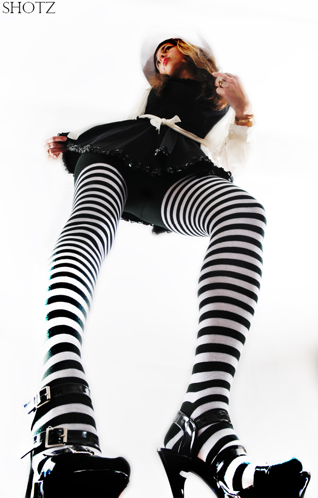 Female model photo shoot of Dinka Doll by Kean Creative in His studio
