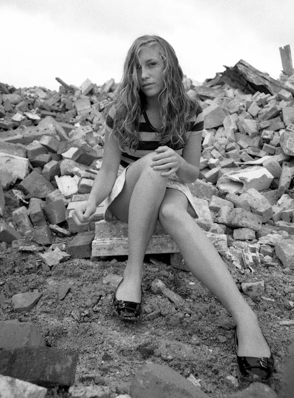 Female model photo shoot of Nina Glady in construction site