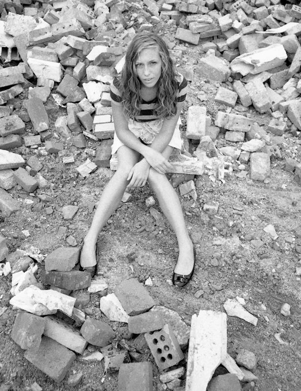 Female model photo shoot of Nina Glady in construction site