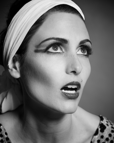 Female model photo shoot of Usha Menard in New York City, makeup by ErdanNewYork