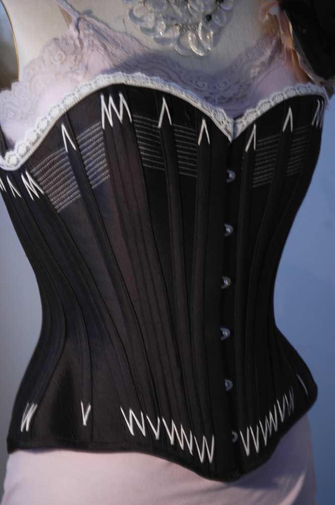 Female model photo shoot of Totally Waisted Corset in Toronto, Canada