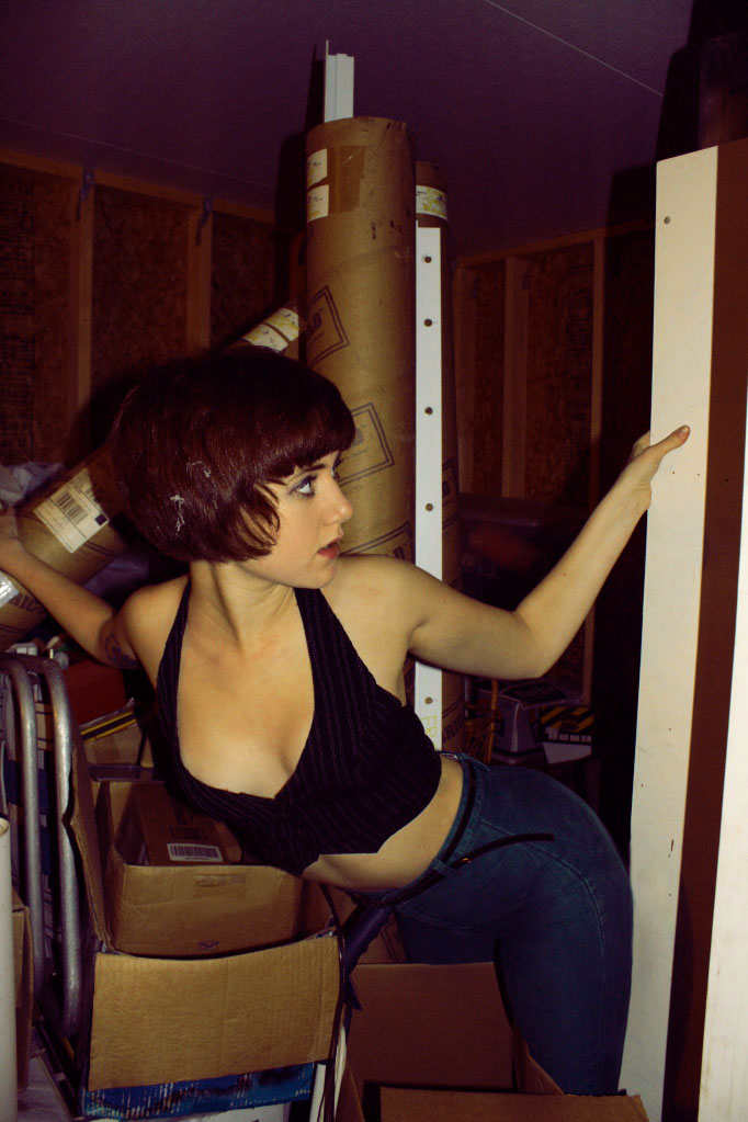 Female model photo shoot of Jay Lazarus in Storage room.