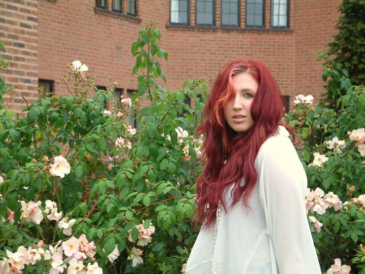 Female model photo shoot of OliviaJGrace in The heavenly rose bush in my hall gardens