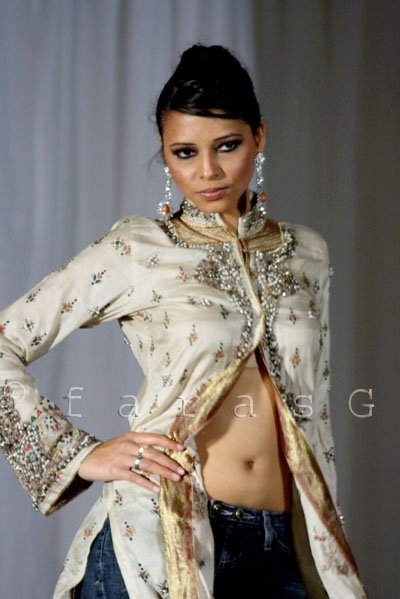 Female model photo shoot of Vijee in Colours of Asia Fashion Show London