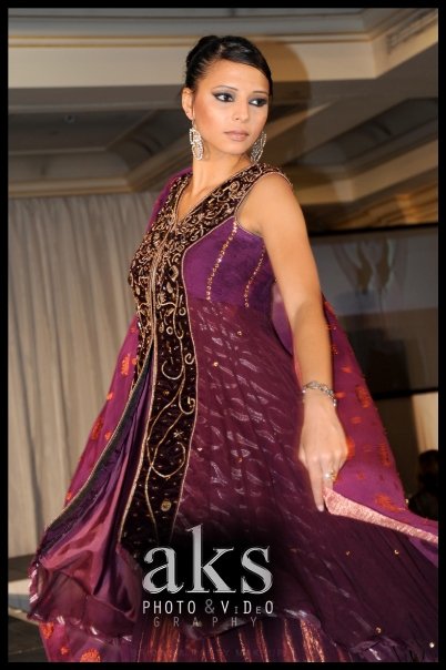 Female model photo shoot of Vijee in Colours of Asia Fashion Show- London